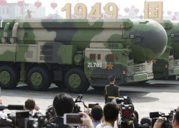 Military vehicles carrying DF-41 intercontinental ballistic missiles travel past Tiananmen Square during the military parade marking the 70th founding anniversary of People's Republic of China, on its National Day in Beijing, China October 1, 2019. REUTERS/Jason Lee