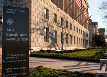 The Department of Commerce building is seen before an expected report of new home sales numbers in Washington, U.S., January 26, 2022.      REUTERS/Joshua Roberts