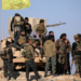 Members of Syrian Democratic Forces (SDF) stand together near Baghouz, Deir Al Zor province, Syria February 12, 2019. Picture taken February 12, 2019. REUTERS/ Rodi Said