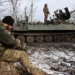 Ukrainian anti-aircraft gunners of the 93rd Separate Mechanized Brigade Kholodny Yar monitor the sky from their positions in the direction of Bakhmut in the Donetsk region, amid the Russian invasion of Ukraine, on February 20, 2024. (Photo by Anatolii STEPANOV / AFP)