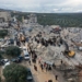 Civil defense workers and residents search through the rubble of collapsed buildings in the town of Harem near the Turkish border, Idlib province, Syria, Monday, Feb. 6, 2023. A powerful earthquake has caused significant damage in southeast Turkey and Syria and many casualties are feared. Damage was reported across several Turkish provinces, and rescue teams were being sent from around the country. (AP Photo/Ghaith Alsayed)